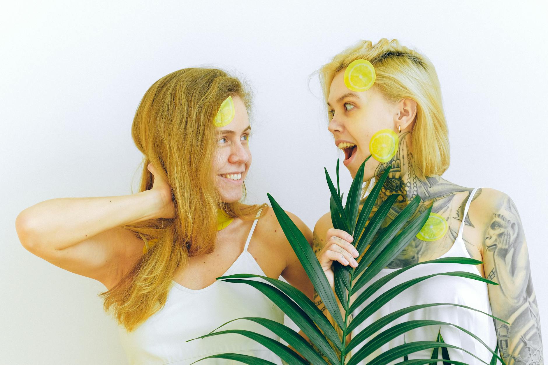 A young couple standing together indoors, exploring intimacy with a vibrator